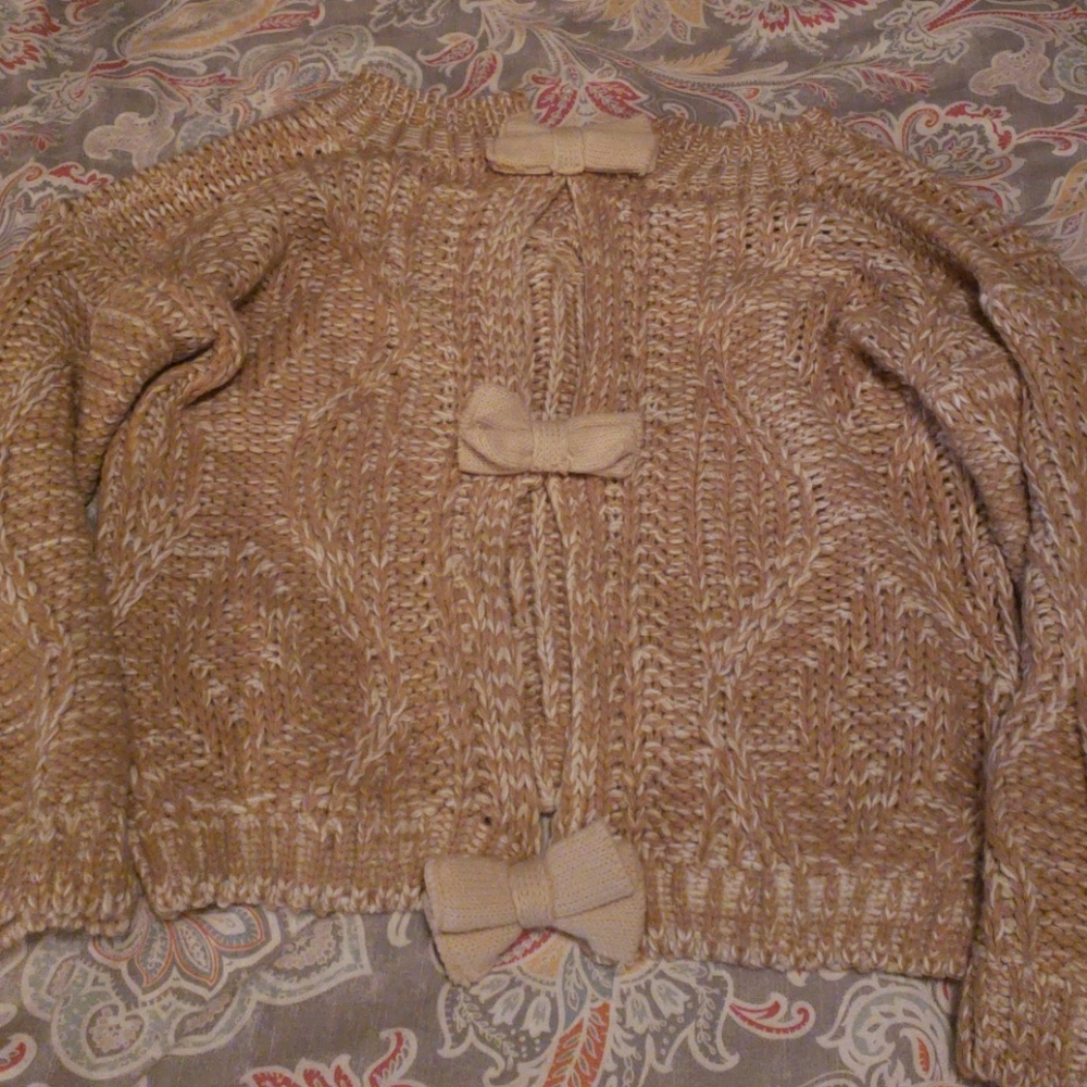 Open back sweater with bow detail